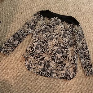 Slightly sheer floral black blouse